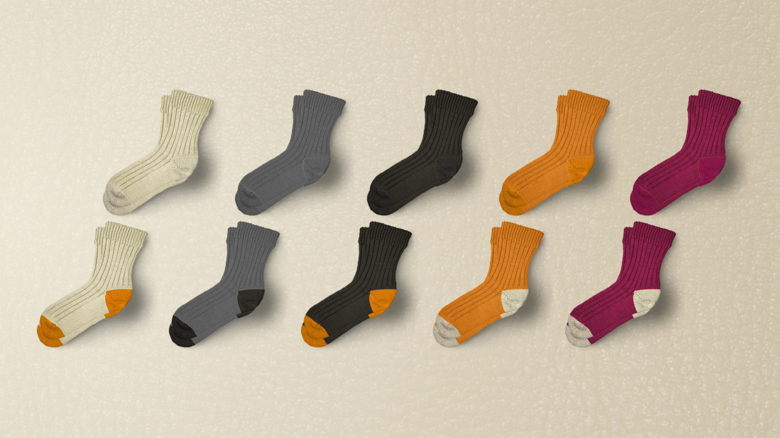 Cotone vintage crew socks in cream, gray, black, apricot, and cranberry, solid and two-tone, photographed for the collection page